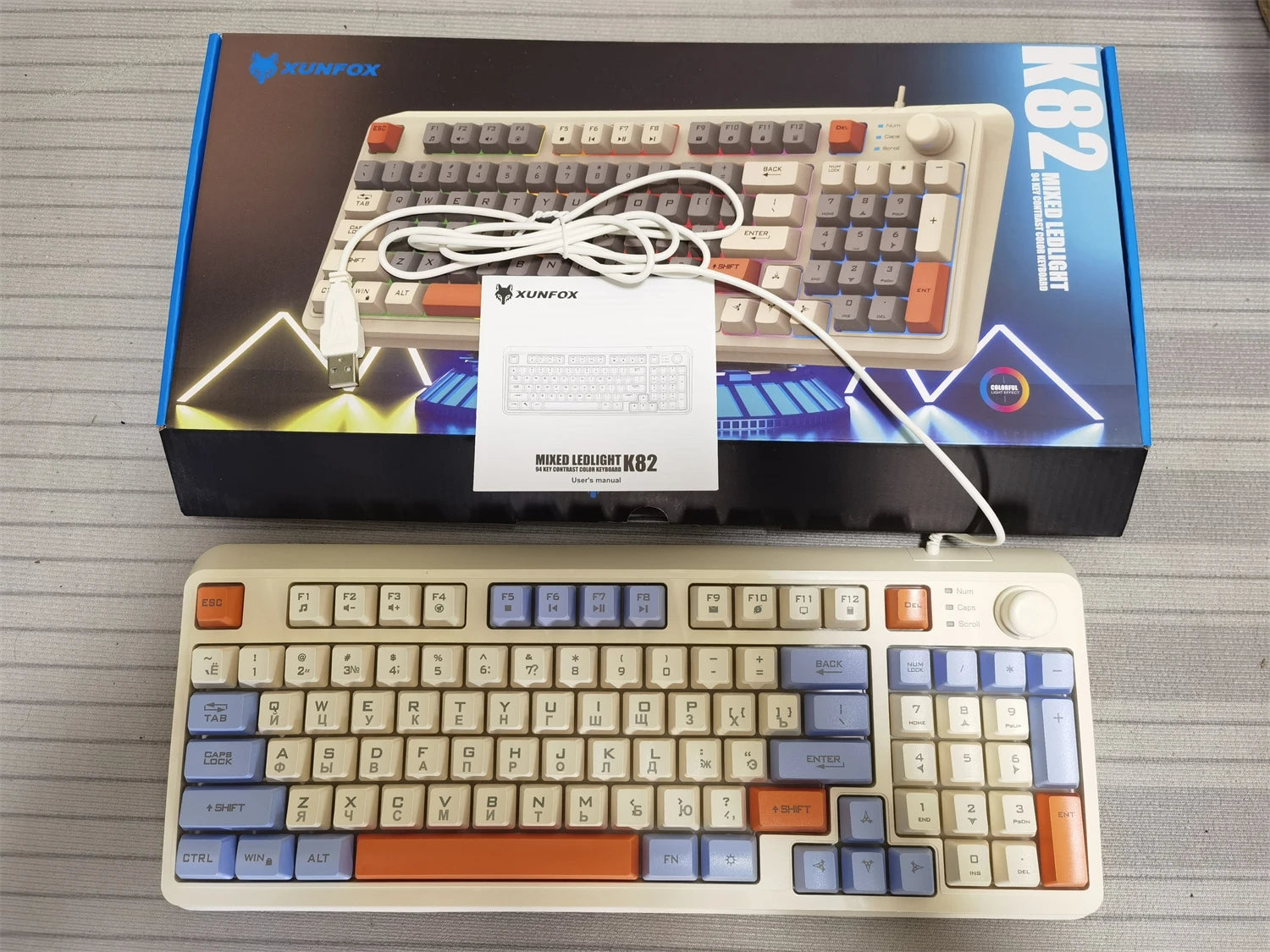 XUNFOX keyboard with beige and gray keys, orange accents and wired cable in box
