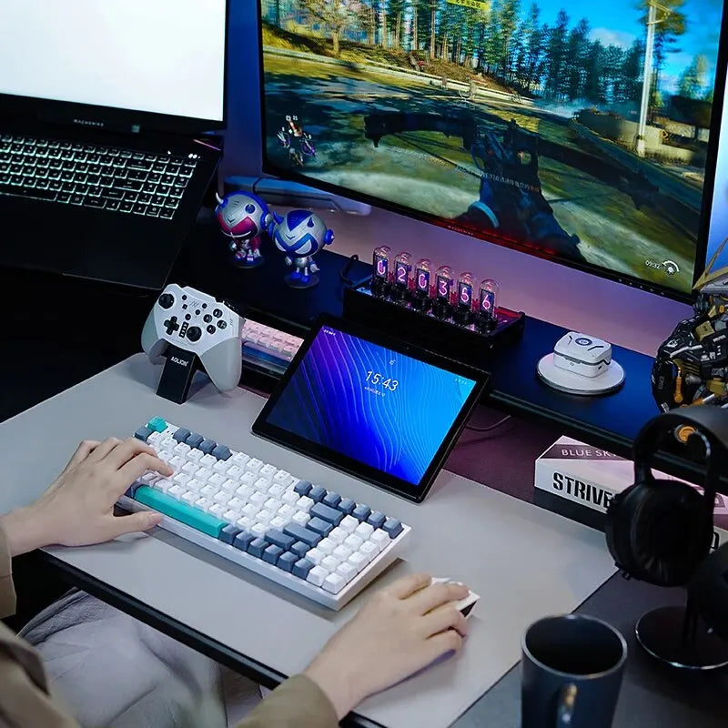 Mechanical keyboard on a desk with white keycaps and purple backlight