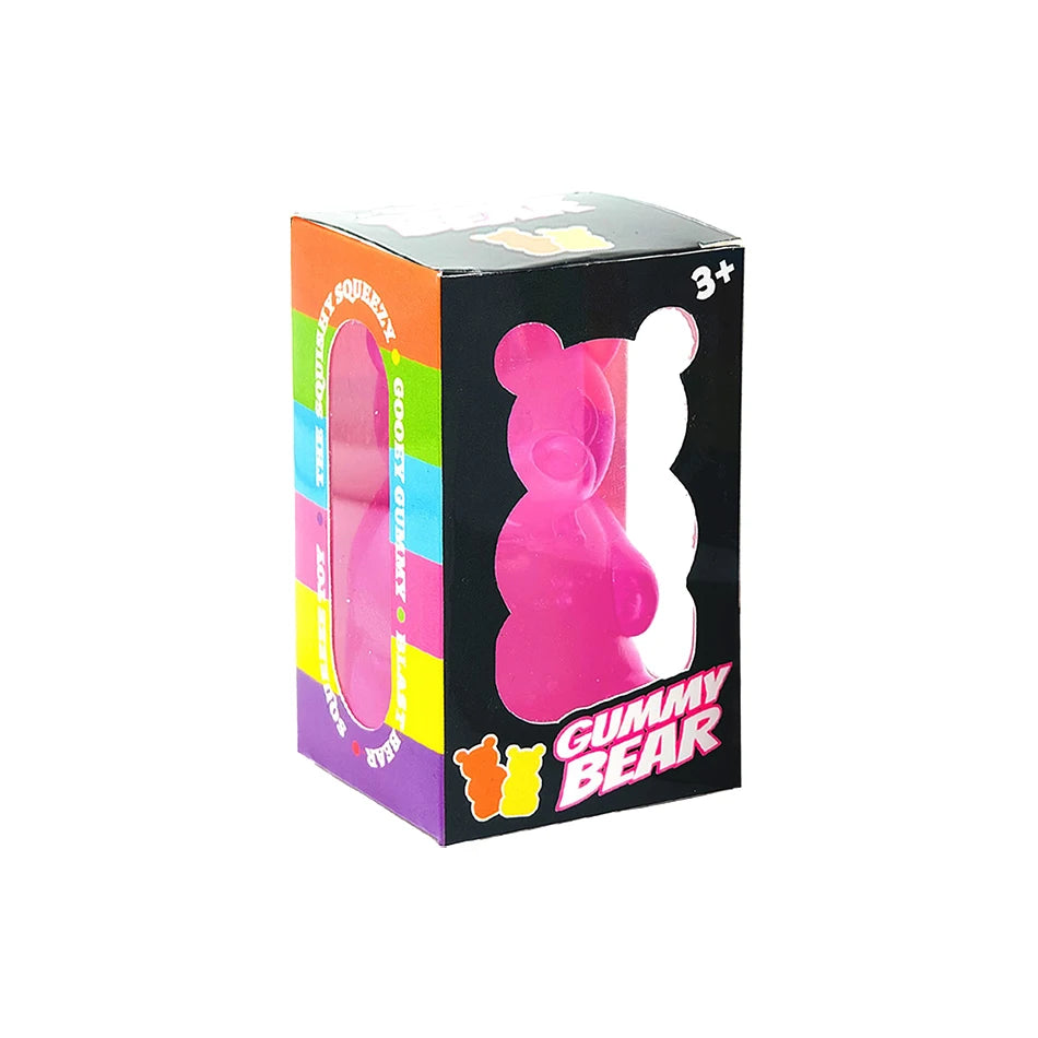 Pink gummy bear squeeze toy in retail box, 3+ rating