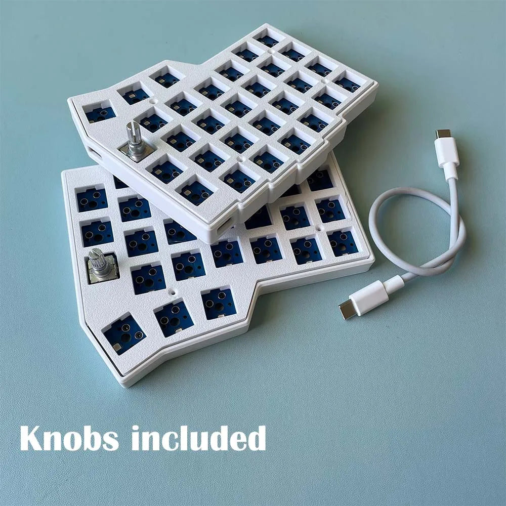 White split ergonomic keyboard with two knob modules and included knob mounts