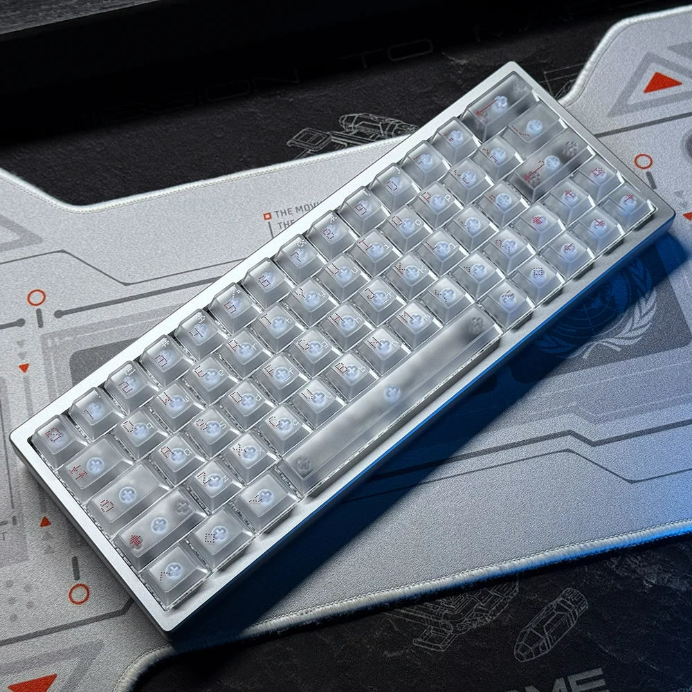 Mechanical keyboard PCB with translucent keycaps and light gray frame