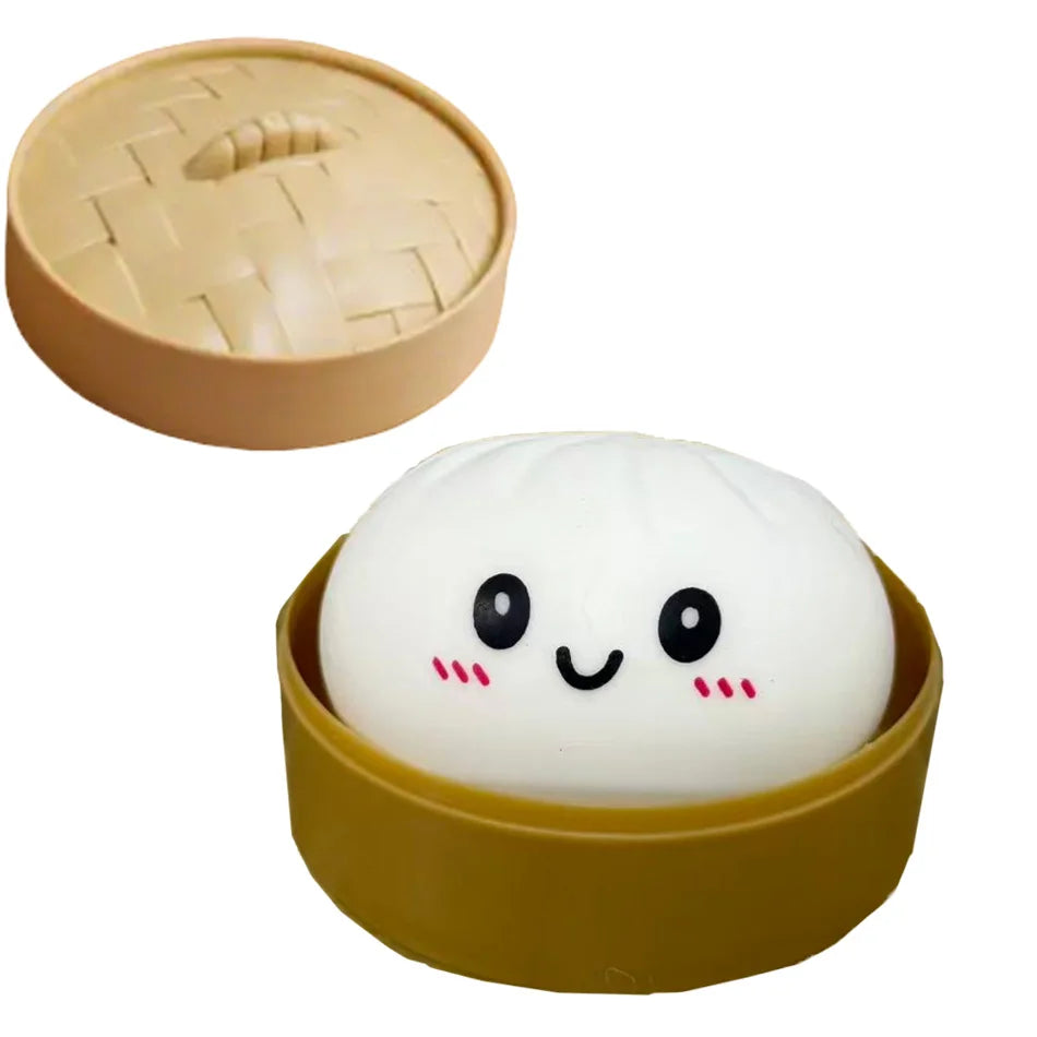 White dumpling squishy in gold rim container with smiling face