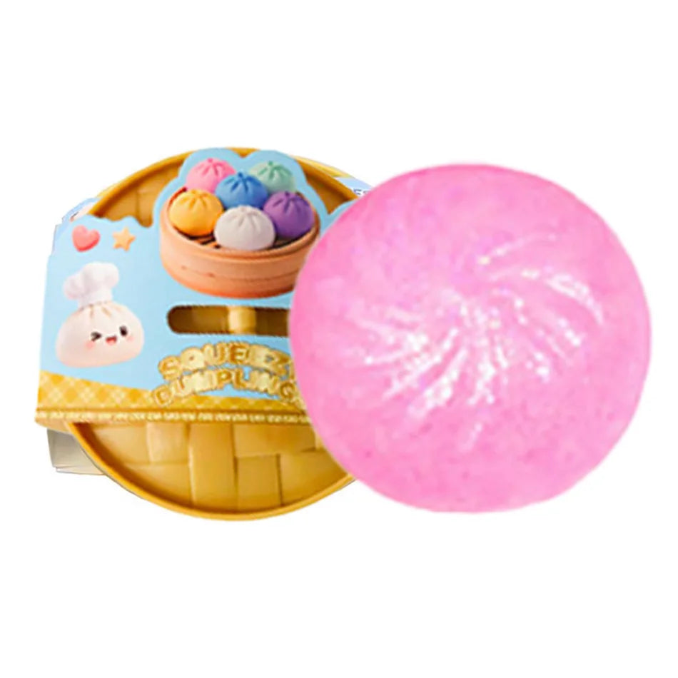 Light pink squishy dumpling character next to packaged set