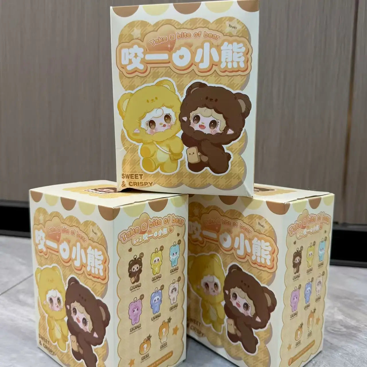 Cardboard retail box for sensory cube toy with bear-themed character graphics, 3-pack set.