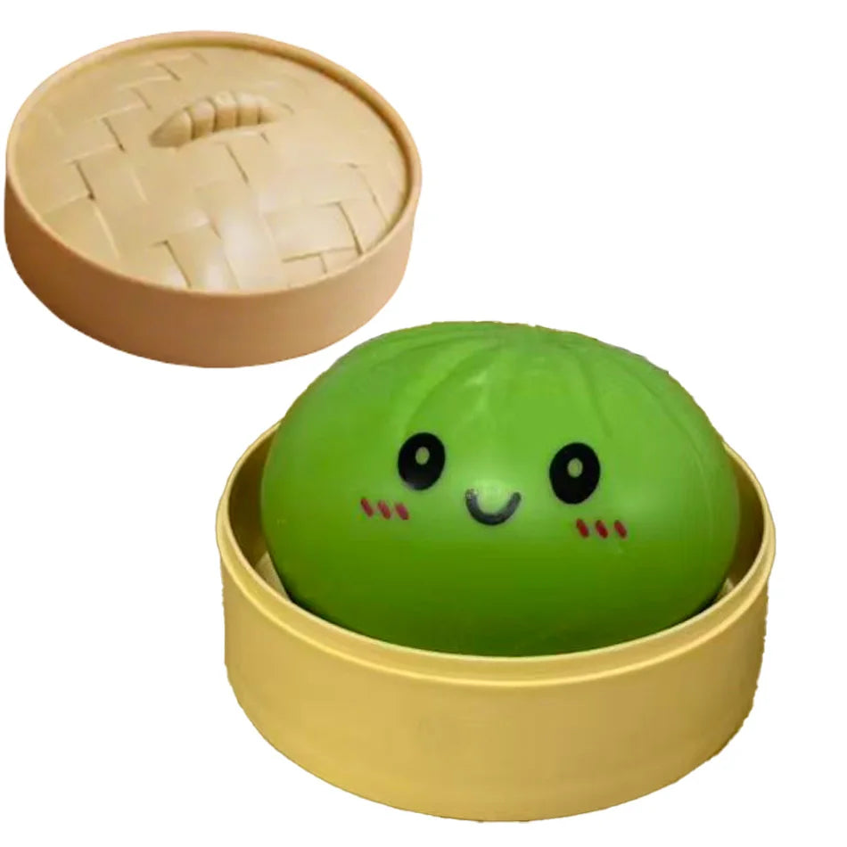 Green round dumpling squishy with cute face, inside beige steamer basket