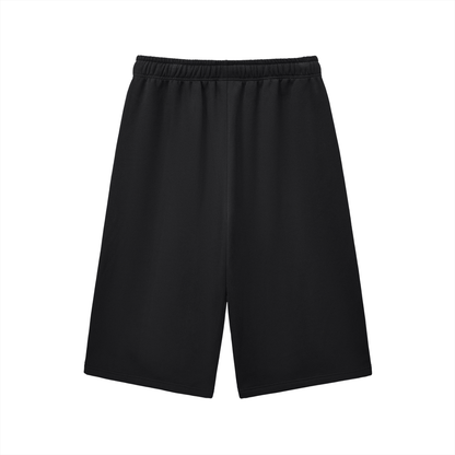 Black three-quarter sweatpants with elastic waistband, relaxed wide legs