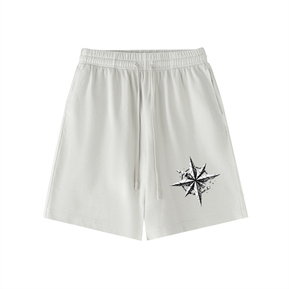 White vintage-wash cotton shorts with elastic waistband, drawstring, and star graphic