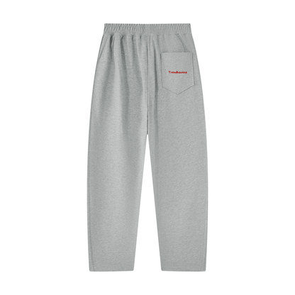Light gray unisex tapered straight hem sweatpants, elastic waist, small logo label on front pocket