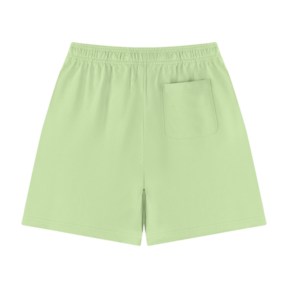 Unisex cotton shorts in light green with side pocket and elastic waistband