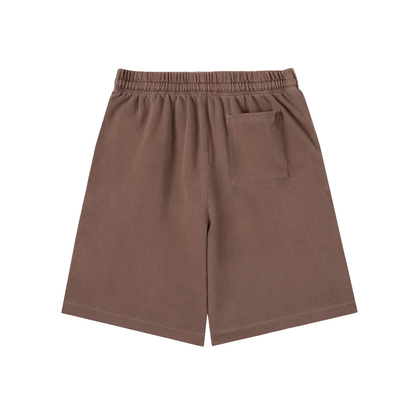 Brown vintage-wash cotton shorts with elastic waistband, drawstring, and front patch pocket.