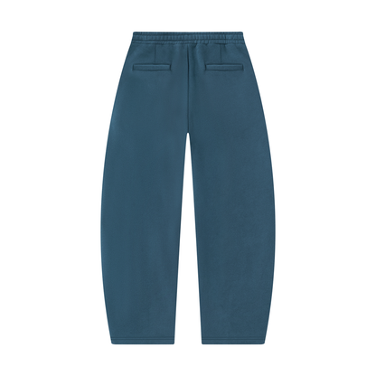 Teal barrel-leg unisex sweatpants with side pockets and elastic waistband