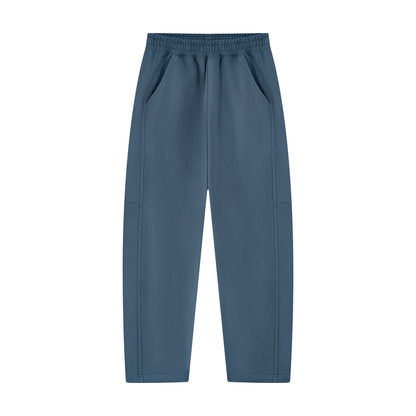 Navy blue unisex sweatpants with elastic waistband and tapered straight hem.