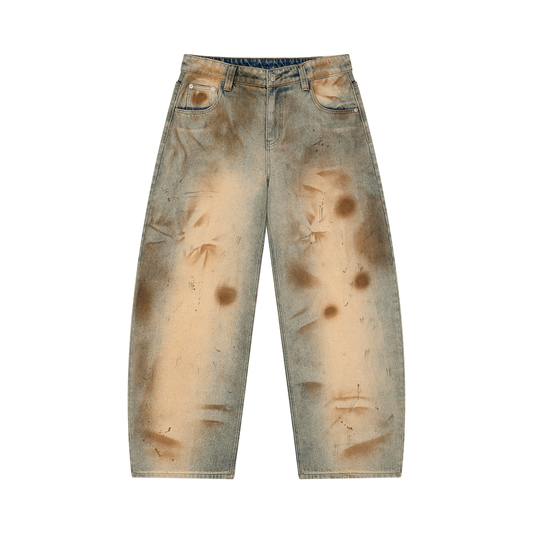 Men's barrel-leg jeans in vintage washed blue with distressed patches and pockets