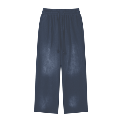 Blue cotton sweatpants with elastic waistband and wide straight legs