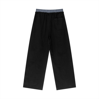 Black wide-leg pants with elastic waist, plaid contrast waistband, side pocket