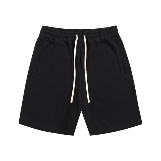 Cotton streetwear shorts, black with elastic waistband and drawstring, side pockets