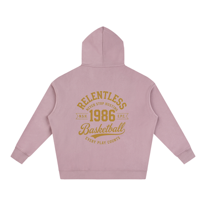 Oversize fleeced hoodie, mauve; back features large “Relentless 1968 Basketball” graphic